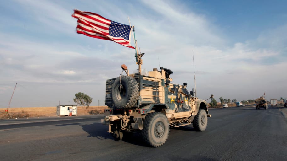 A convoy of U.S. vehicles is seen after withdrawing from northern Syria, in Erbil, Iraq, Oct. 21, 2019. 