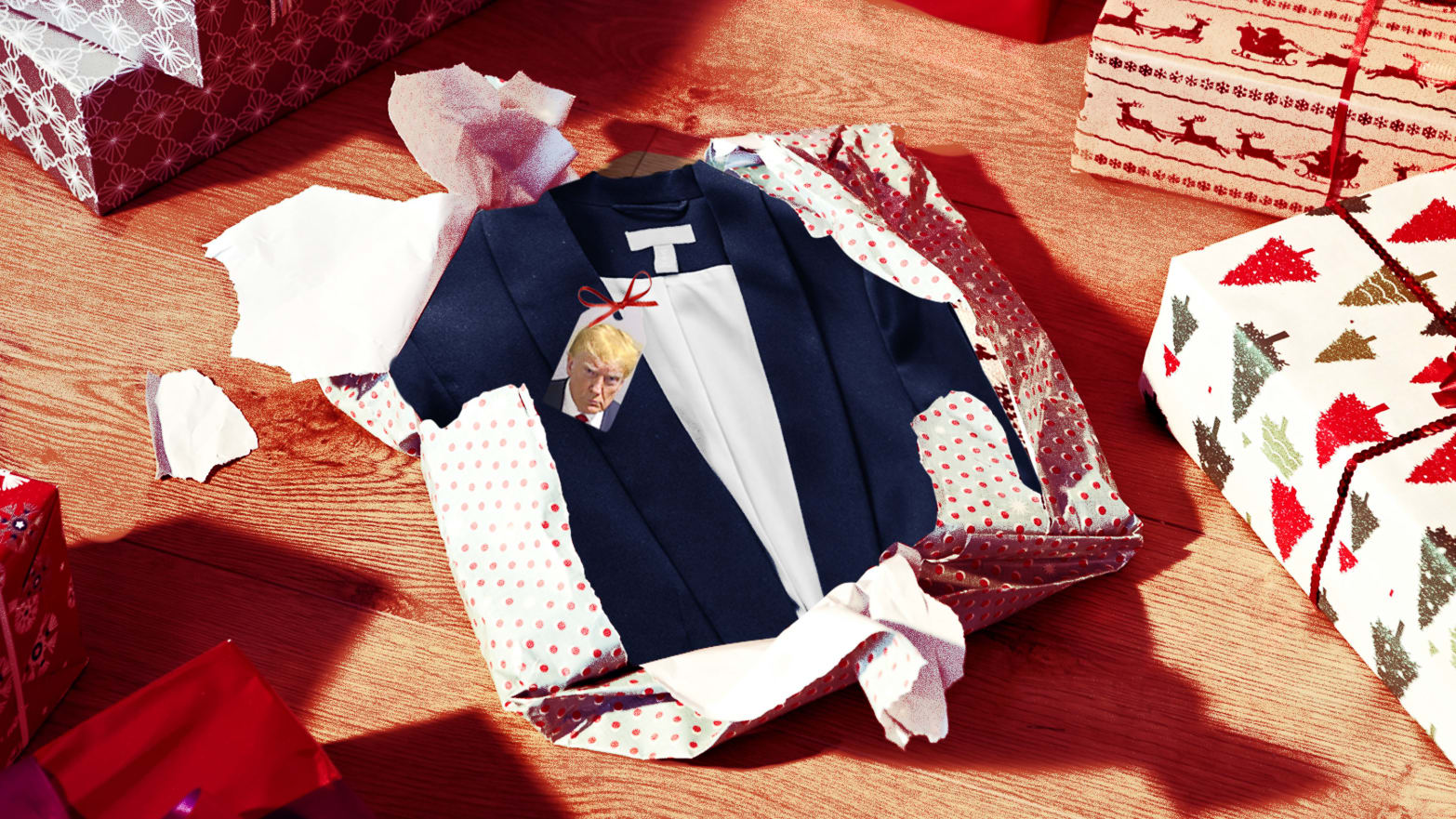 A photo illustration showing an unwrapped gift of Donald Trump’s suit from his Georgia mugshot.