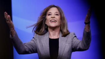 "Democratic presidential candidate author Marianne Williamson acknowledges applause after speaking at the New Hampshire state Democratic Party convention, Saturday, Sept. 7, 2019, in Manchester, NH."