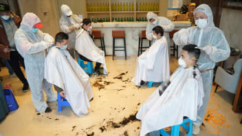 "Volunteer barbers cut the hair for medical workers at the residence of medical team for Hankou Hospital in Wuhan, central China's Hubei Province, Feb. 24, 2020. Five barbers provided free haircut service for members of medical team fighting against the novel coronavirus outbreak in Hankou Hospital as Monday marks Longtaitou Day."