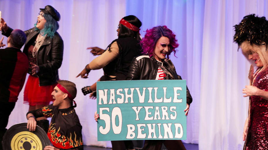 Members of Friends of George’s perform on the stage after a federal judge temporarily blocked a law bill aimed to restrict drag performances in public or in front of children in Memphis, Tennessee, U.S., April 21, 2023.
