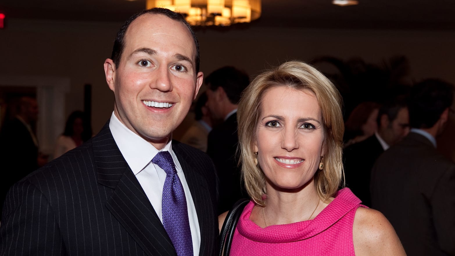 Raymond Arroyo and Laura Ingraham pose for a photo together in 2010.