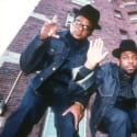 The members of Run DMC pose for a photo 