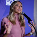 A photo of Lara Trump at a campaign rally for her father-in-law.