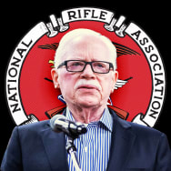 Bob Barr, former United States Congressman for Georgia's 7th Congressional district and the NRA logo.