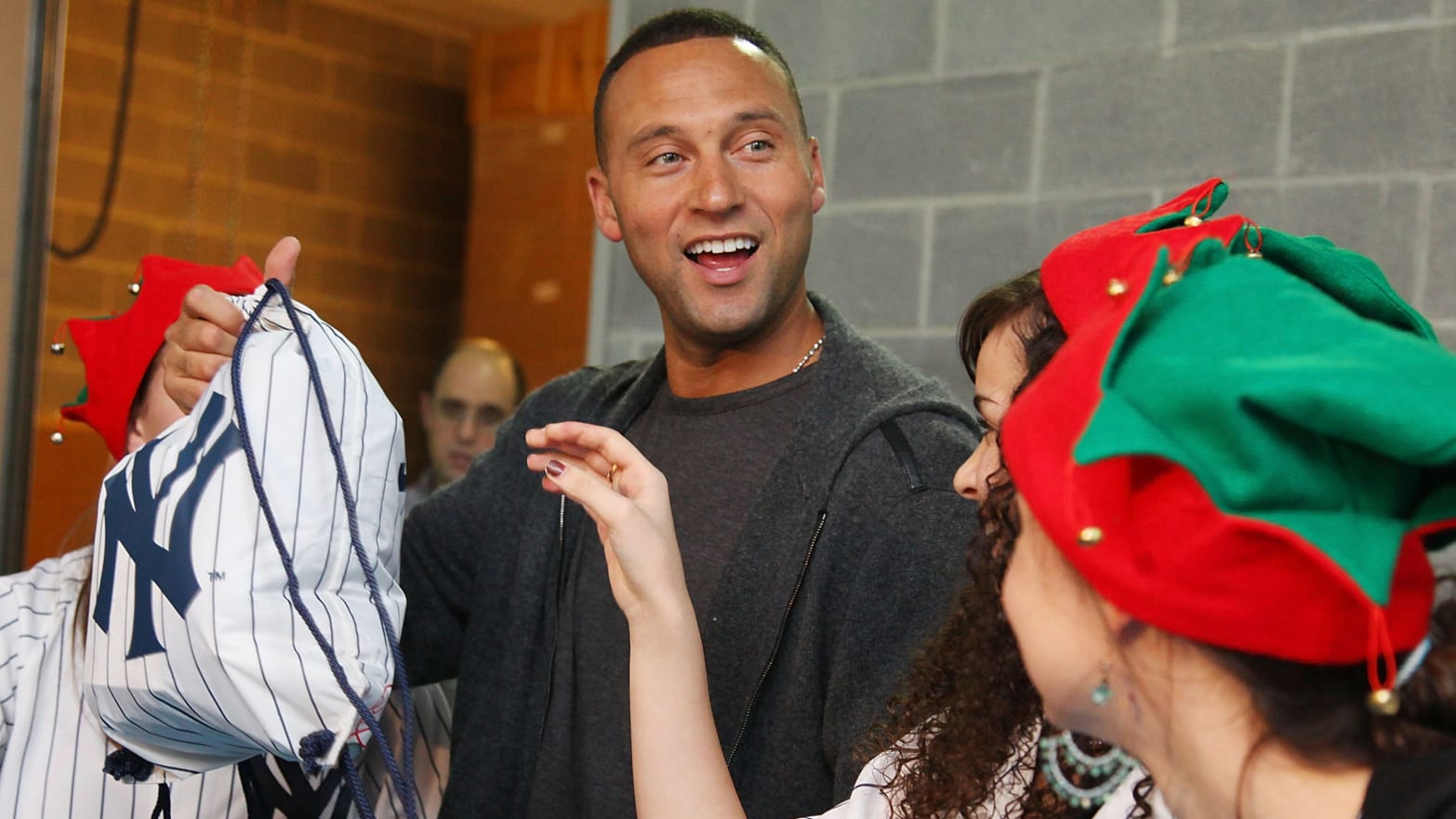 Derek Jeter adds a bronze bat to his collection of farewell gifts