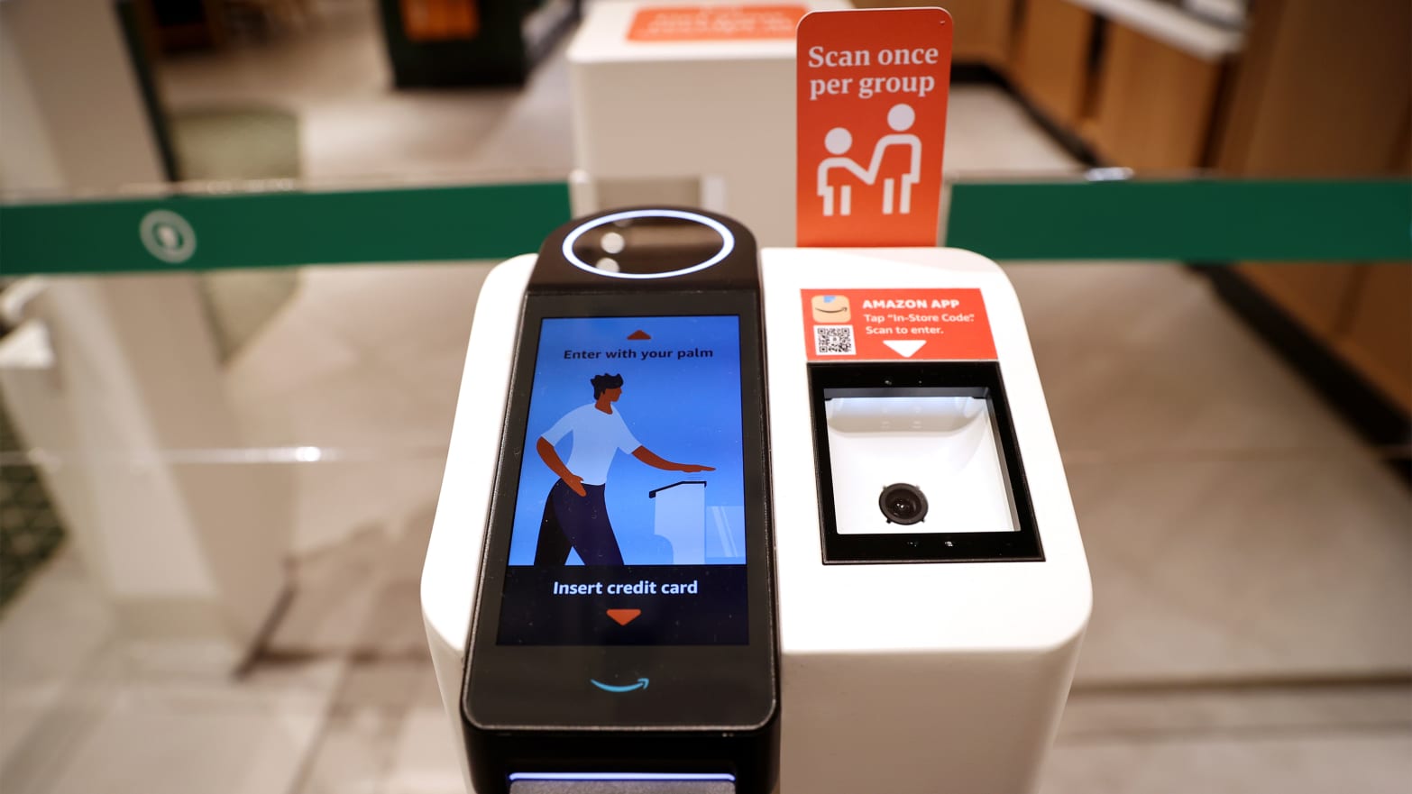 A scanner at an entrance turnstile of a new Starbucks store partnered with Amazon Go.