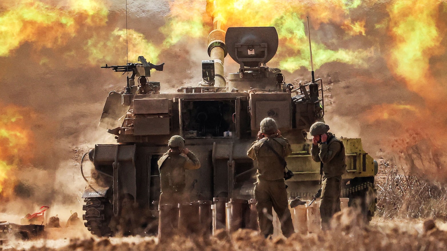 A photo including an Israeli army howitzer