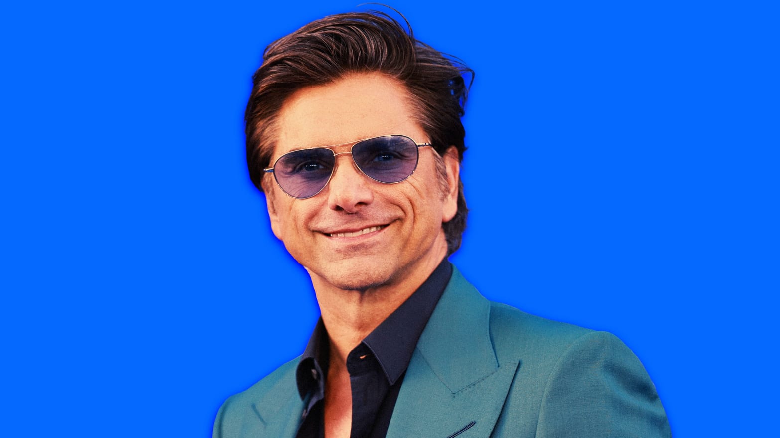 A photo illustration of actor John Stamos on a blue background.