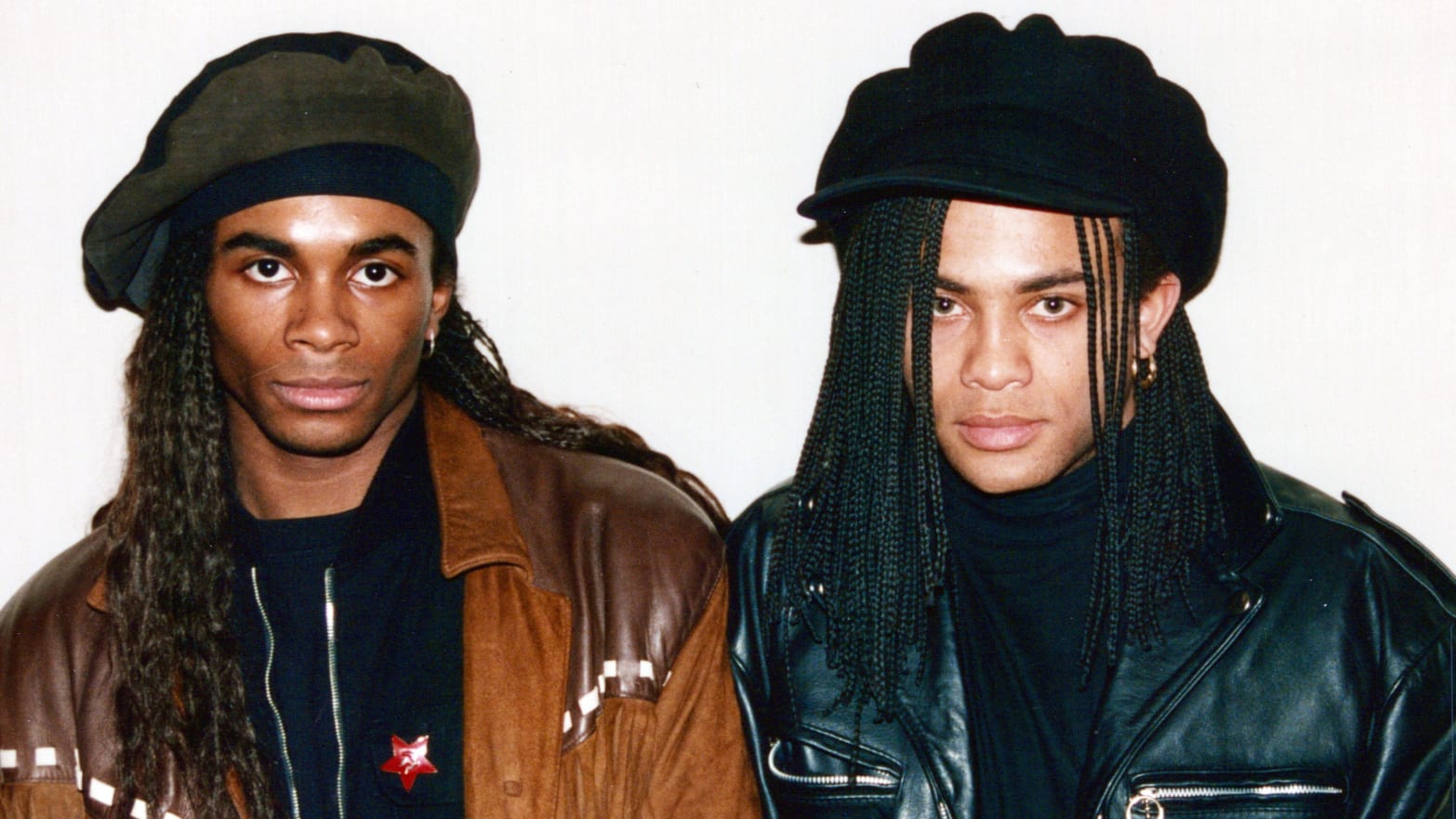A photo of Milli Vanilli's Fab Morvan and Rob Pilatus against a white background