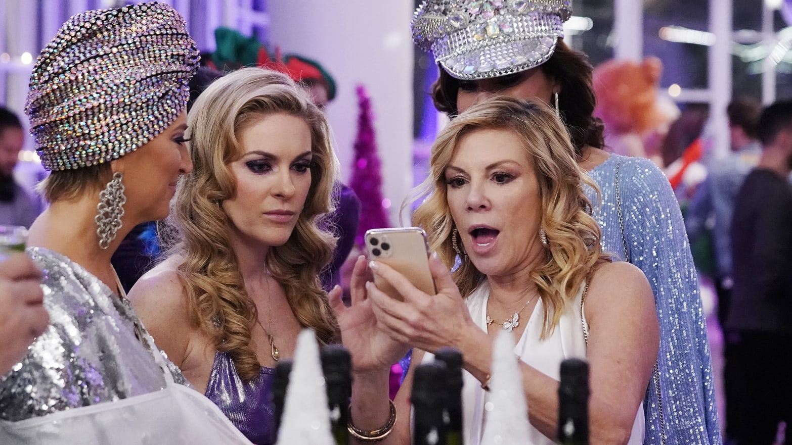 Ramona Singer looks at a phone with a shocked expression in "The Real Housewives of New York"