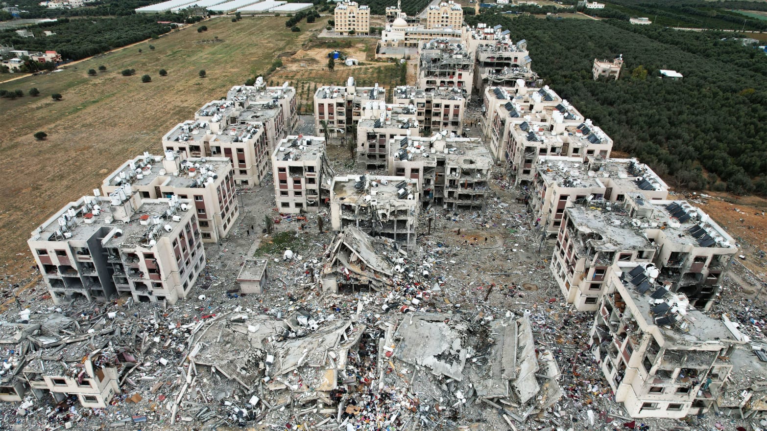 A photo including an aerial view showing the destruction caused by Israeli strikes in Wadi Gaza, in the central Gaza Strip