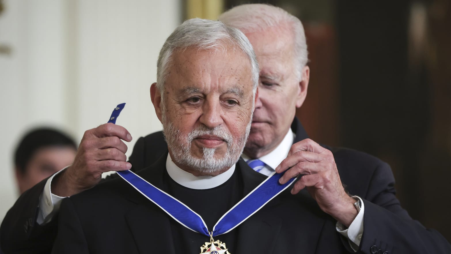 President Joe Biden presents the Presidential Medal of Freedom to Father Alexander Karloutsos.