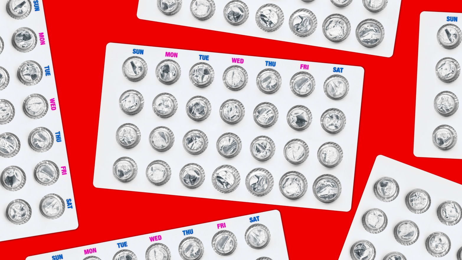 A photo illustration of empty birth control pill packets.