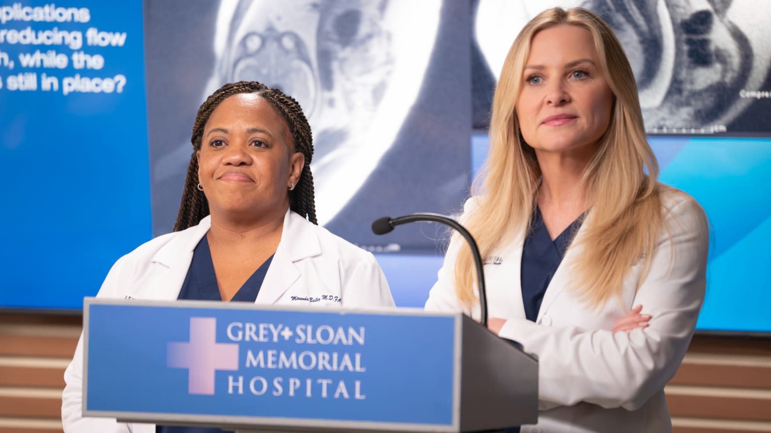 Dr. Miranda Bailey (Chandra Wilson), left, and Dr. Arizona Robbins (Jessica Capshaw), right, brief their colleagues on an upcoming procedure