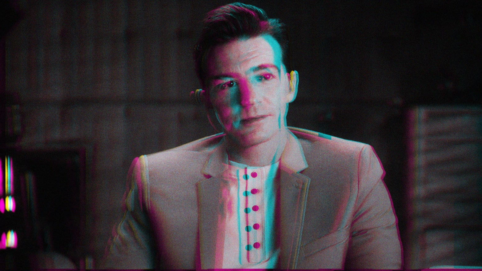 A photo illustration showing a glitched still of Drake Bell in Quiet on Set.