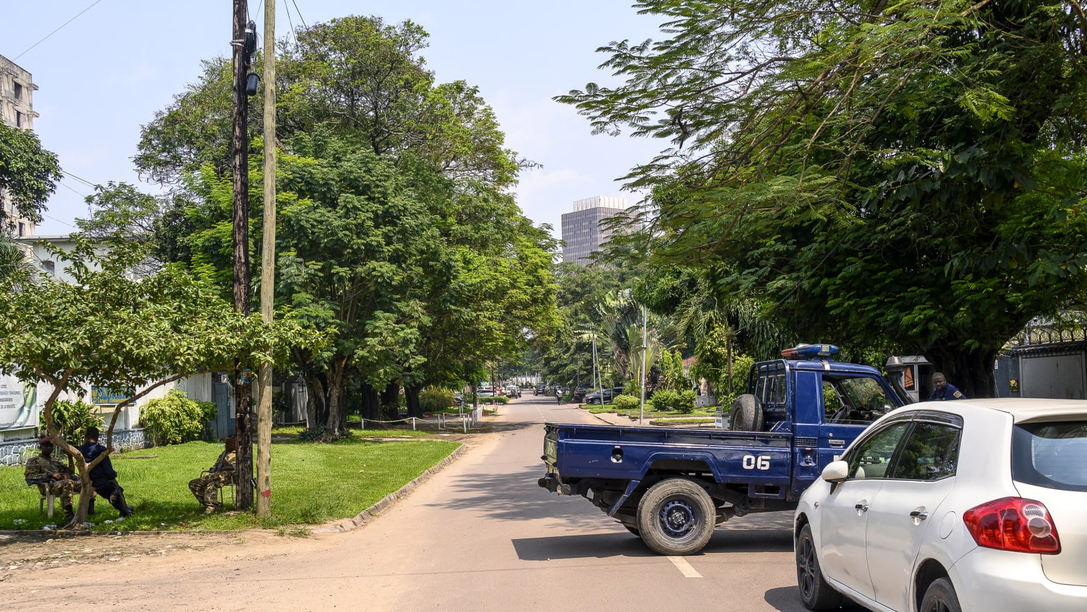 The Congolese Republican Guard and police block a road around the scene of an attempted Coup in Kinshasa.