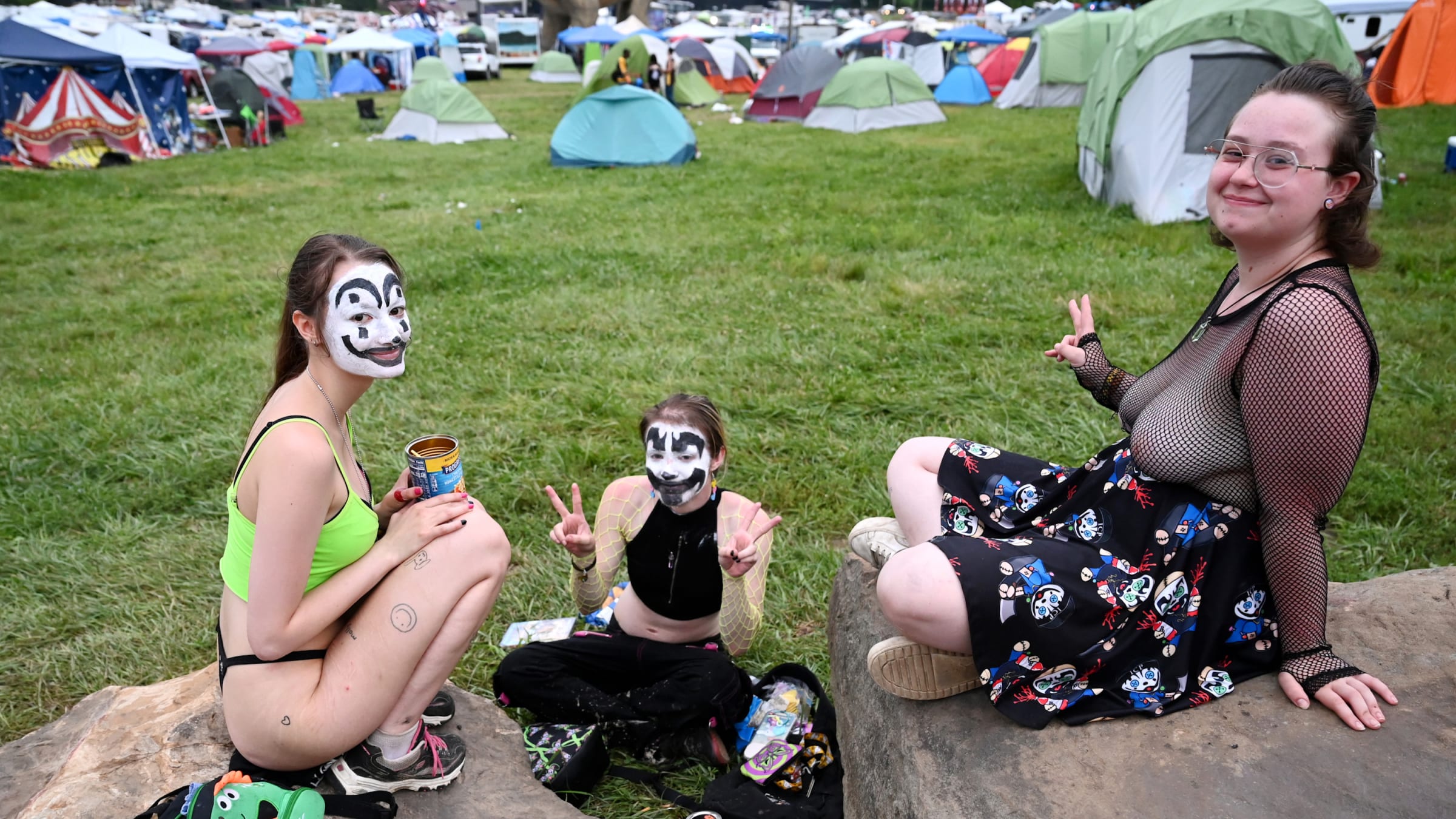 A group of fans pose together at the 2023 Gathering of the Juggalos