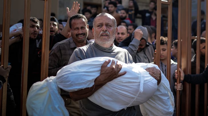 Palestinians mourn and carry the bodies of their loved ones who lost their lives after an attack of the Israeli army in Khan Younis, Gaza.