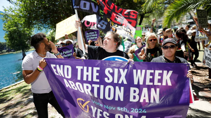 Abortion rights advocates gather to launch their campaign with a march against the six-week abortion ban ahead of November 5, when Florida voters will decide on whether there should be a right to abortion in the state, in Orlando, April 13, 2024. 