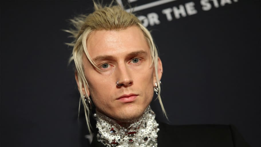 An image of Machine Gun Kelly at a pre-Grammys event.