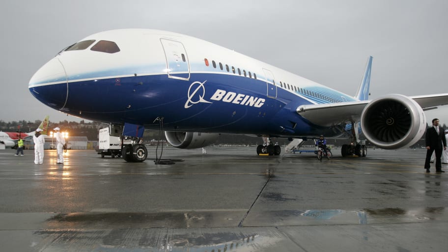 The Boeing 787 Dreamliner sits on the tarmac at Boeing Field in Seattle, Washington, after its maiden flight.