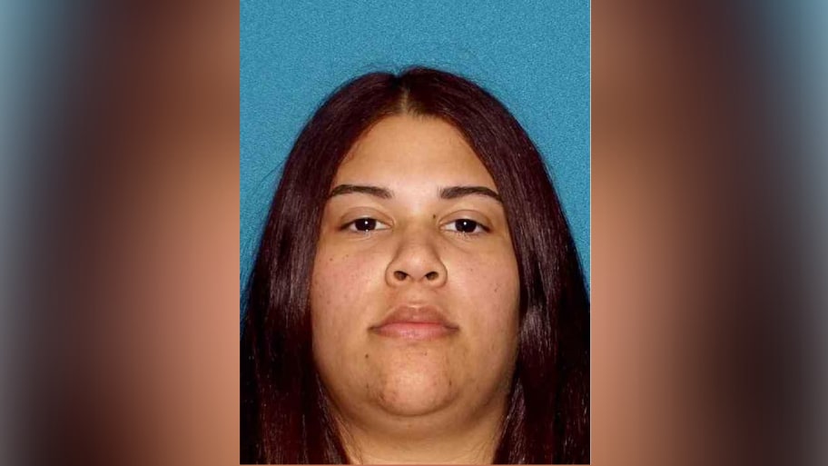 A mugshot of Amanda Davila, a school bus monitor who has been charged in the death of a 6-year-old passenger after a seat belt strangled her without Davila noticing.