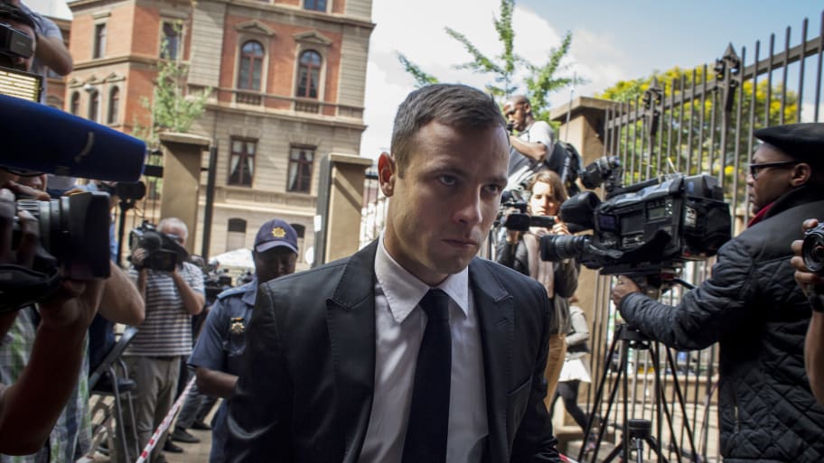 Oscar Pistorius arrives for the fourth day of sentencing at North Gauteng High Court on October 16, 2014