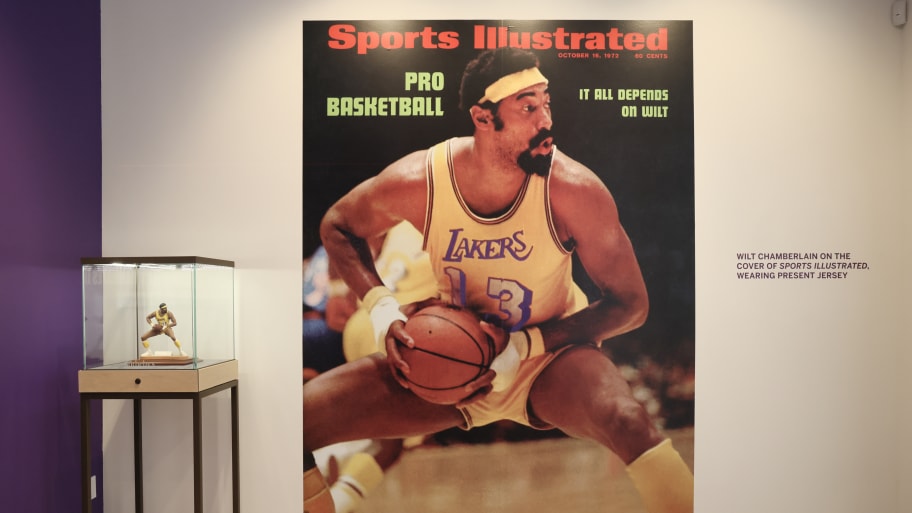An iconic Sports Illustrated cover and signed limited edition Wilt Chamberlain sports porcelain figurine on display during a press preview at Sotheby's Auction House in August 2023.