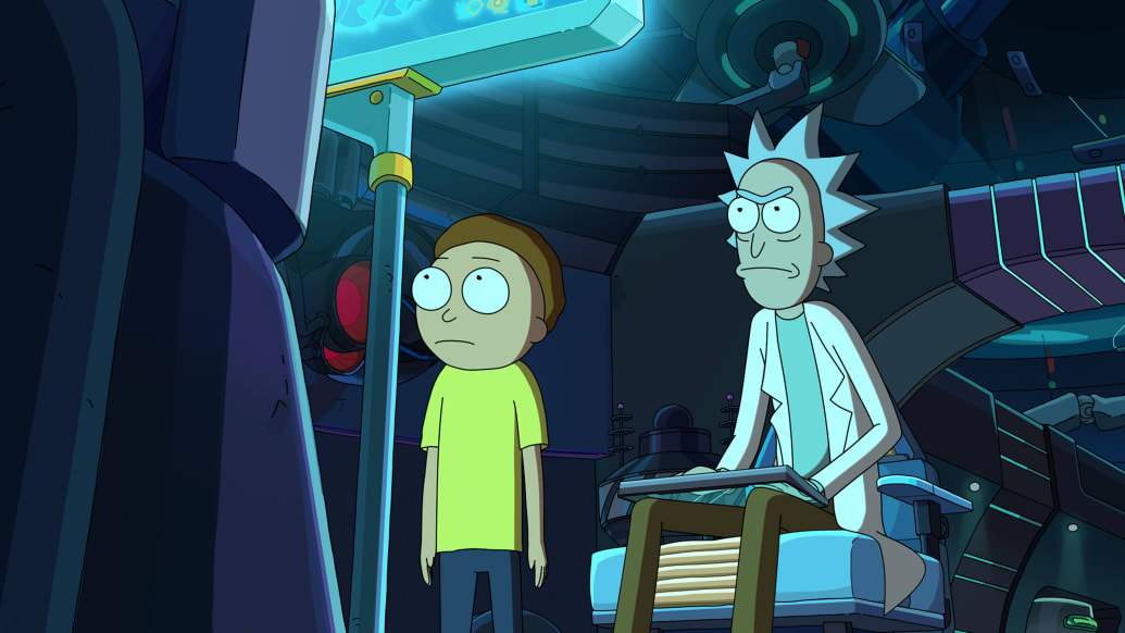 Rick and Morty sit next to each other in a space ship in a still from ‘Rick and Morty’