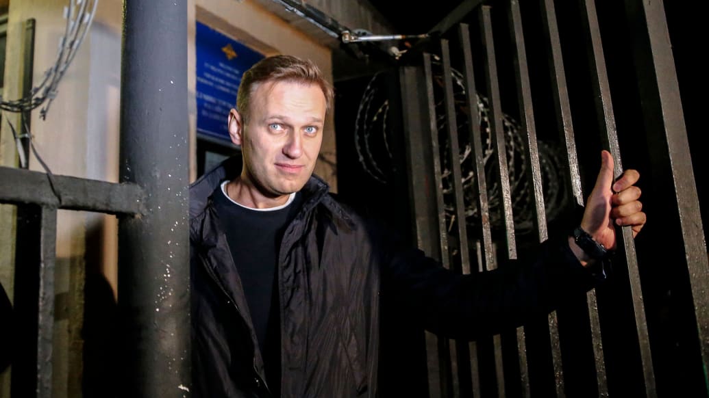 Navalny leaving a police station after yet another arrest in 2017.