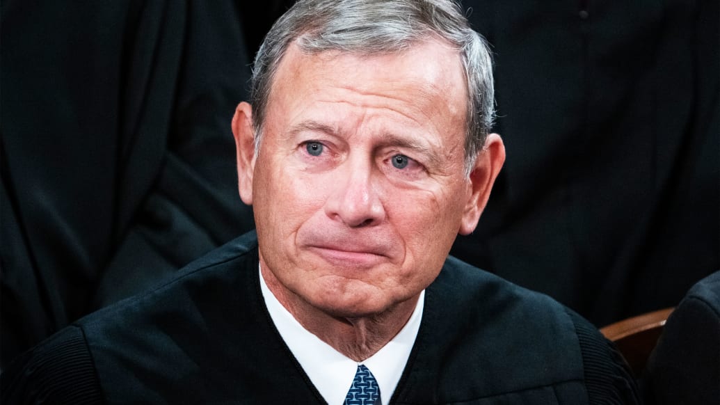 A photo including Supreme Court Chief Justice John Roberts