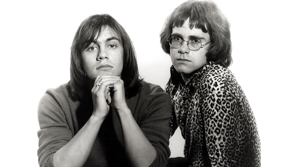 A photo including Elton John and Bernie Taupin