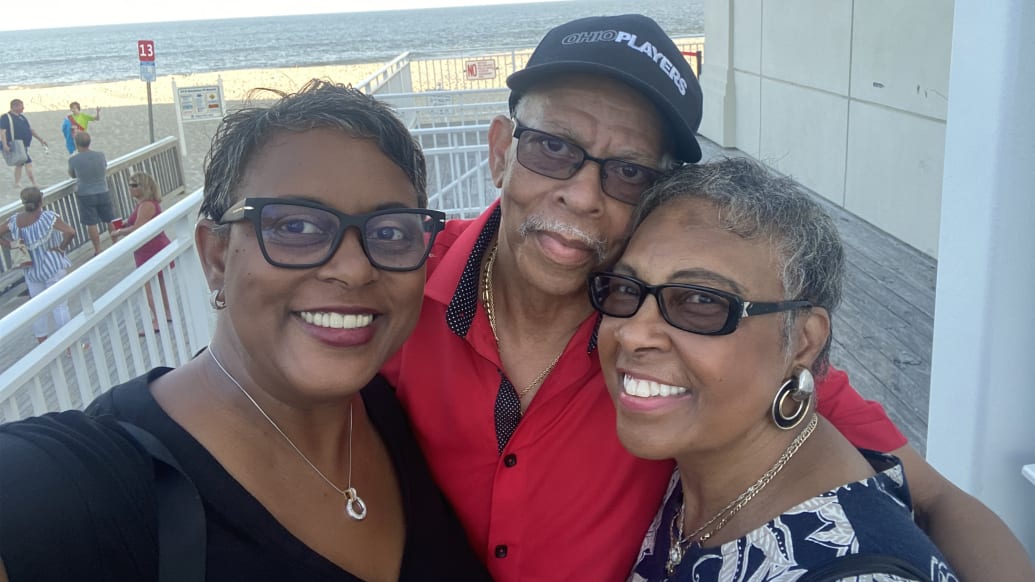 Schele Williams, left, with her father, James "Diamond" Williams, and mother, LaDon Williams.