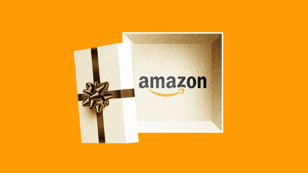 Photo illustration of a gift box with the Amazon logo in it on an orange background