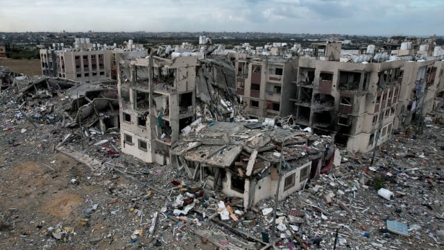 A photo depicting an aerial view showing the destruction caused by Israeli strikes in Wadi Gaza, in the central Gaza Strip