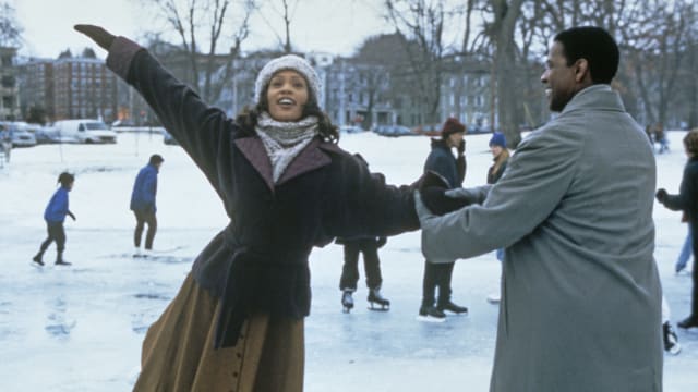 Whitney Houston and Denzel Washington in the The Preacher's Wife.