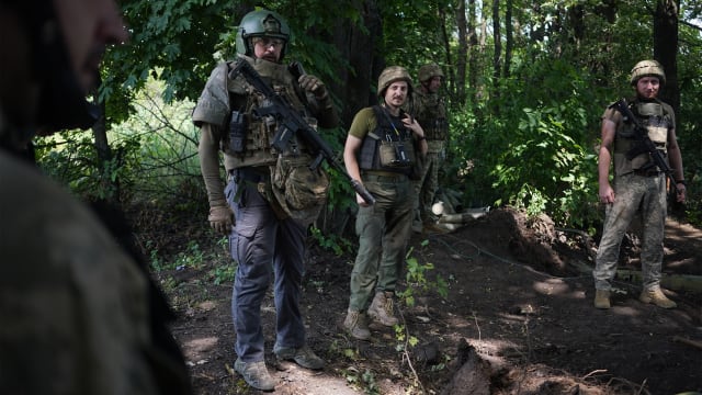 A photo of Ukrainian soldiers of the Bohun brigade near the Russian lines in Lyman, Ukraine.