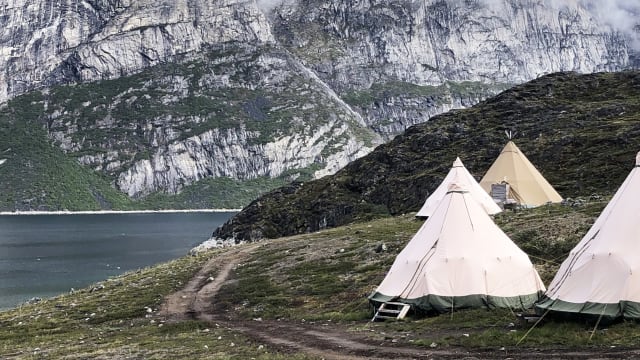 A photograph of the Kiattua camp on coastline of Greenland.