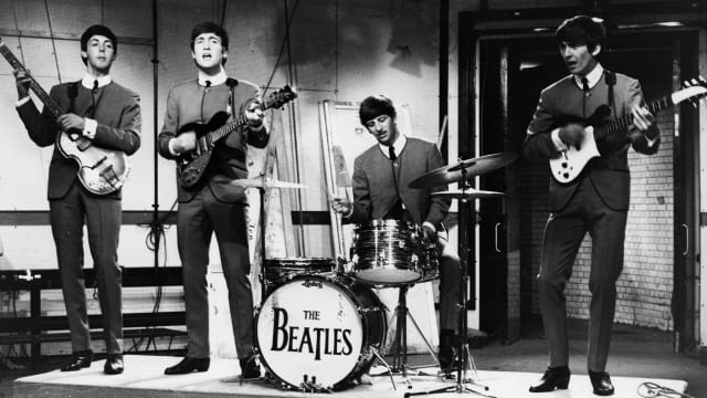 A photo of the Beatles performance. 