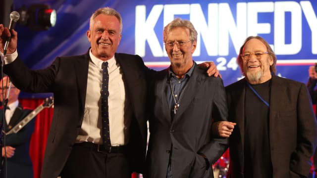 Robert F. Kennedy Jr. poses with Eric Clapton and Stephen Stills