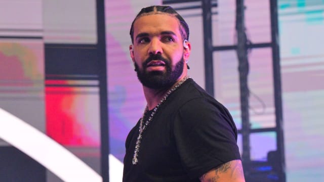 Drake performs onstage at a concert in Atlanta