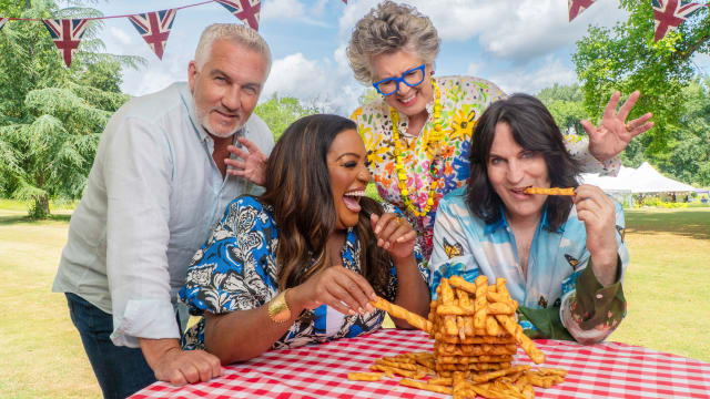 Promotional image of the judges of the Great British Baking Show.