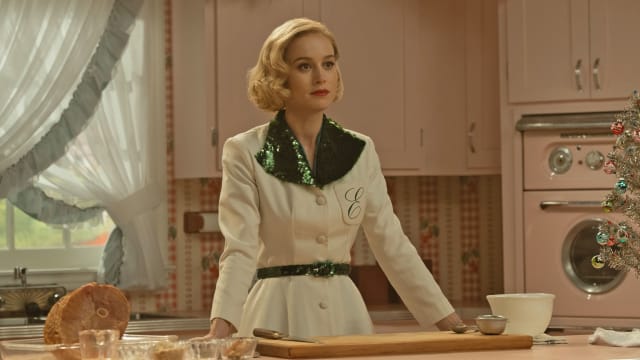 Brie Larson standing in a kitchen in 'Lessons in Chemistry'