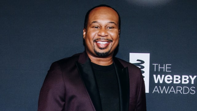 Roy Wood Jr. smiles on the Webby Awards red carpet