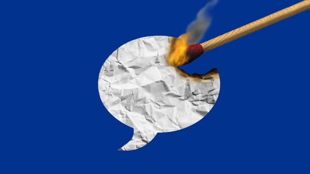 A photo illustration of a paper speech bubble be lit on fire with a match.
