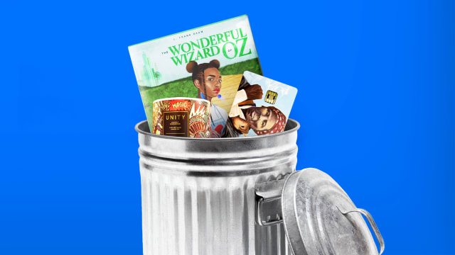 A photo illustration of a Black History Month themed items like a Barnes&Noble book, Bed Bath and Beyond candle, and OneUnited debit card in a trash can.