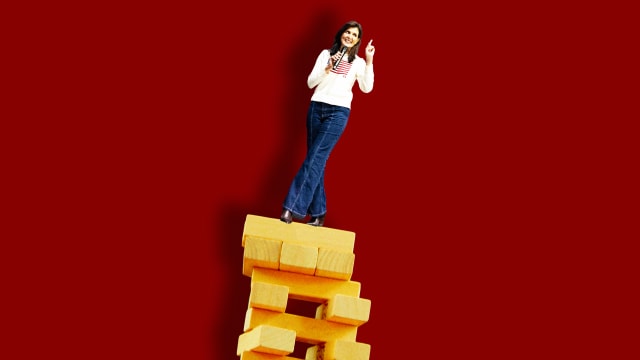 A photo illustration of Nikki Haley balancing on Jenga blocks.