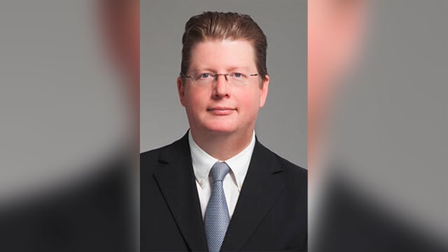 Bryan Malinowski, an Arkansas airport executive, was hospitalized Tuesday after he was shot by federal agents attempting to search his home.