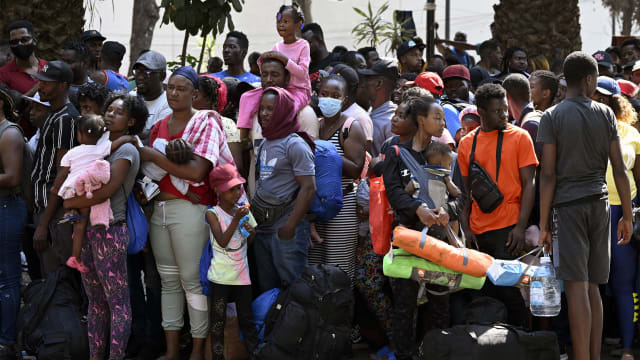 Migrants, mostly Haitians, wait to be sent to different migration centers in Puebla, Hidalgo, and Queretaro to obtain their humanitarian visas.